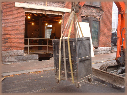 Safe being lifted out